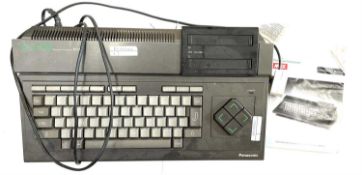 A 1985 Panasonic MSX CF-2700 personal computer and original manual