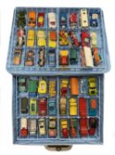A vintage plastic Matchbox collectors case, containing a quantity of various die-cast and plastic