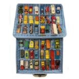 A vintage plastic Matchbox collectors case, containing a quantity of various die-cast and plastic