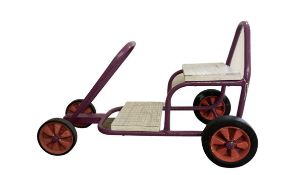 A scratchbuilt child's wooden and metal go-kart.