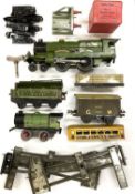 A mixed lot of 0 gauge tin plate Hornby rolling stock, locomotives, track etc, to include The Flying