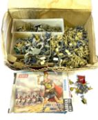 A mixed lot of vintage plastic toy soldiers, some unpainted, to include: - Various army men and H0-