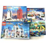 A mixed lot of 1990s Lego System sets in original boxes, transport and underwater themes,