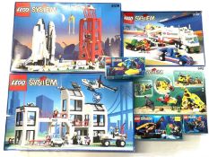 A mixed lot of 1990s Lego System sets in original boxes, transport and underwater themes,