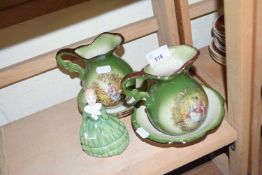 Two miniature wash bowls and jugs together with a Royal Doulton figurine