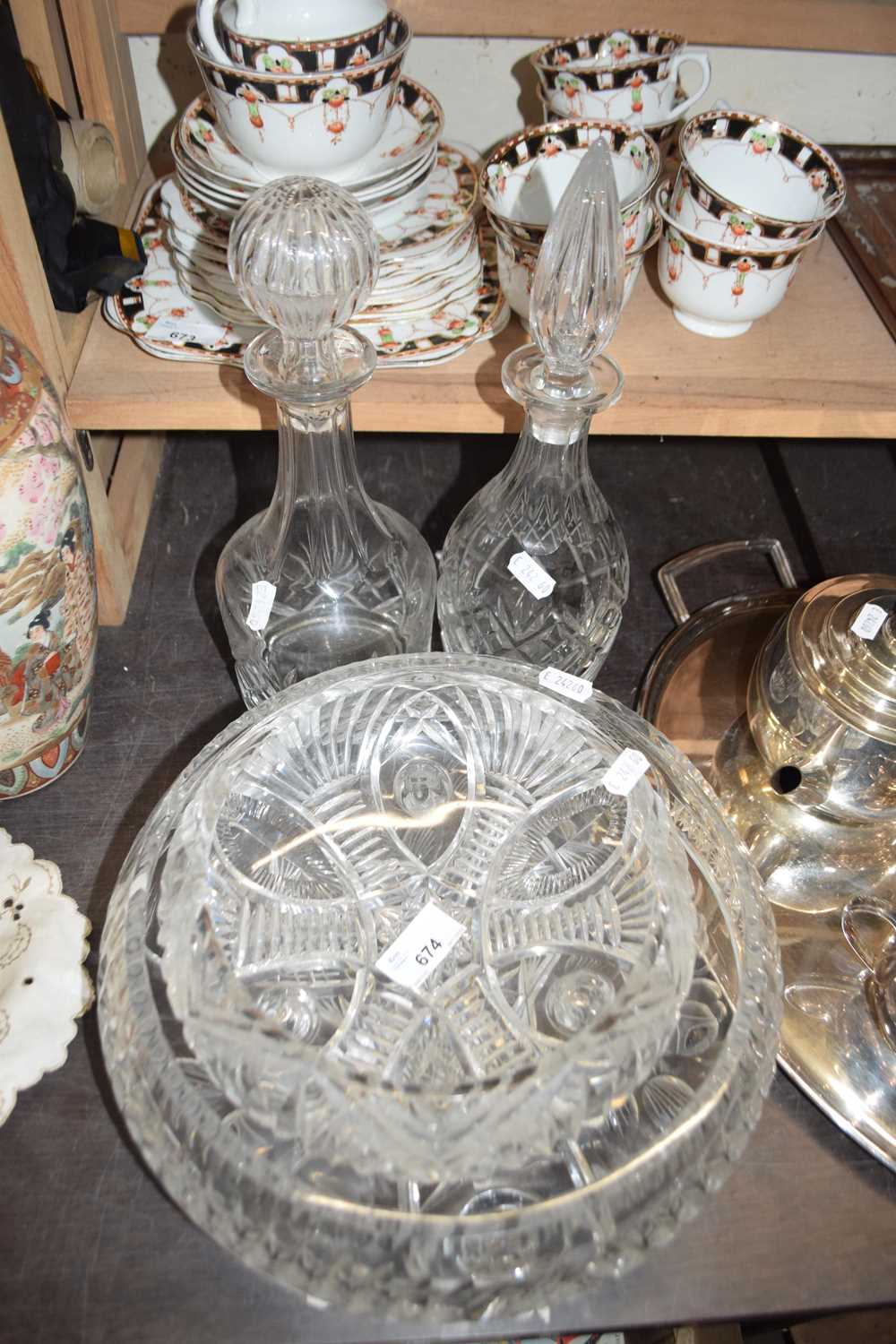 Two decanters and two cut glass bowls