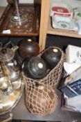 Group of four hardwood lawn bowls