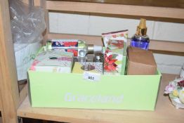 Box of various assorted cosmetics