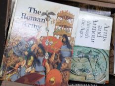 Box of mixed books to include The Roman Army by Peter Connoly, Arms and the Armour Through the