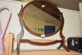 Oval dressing table mirror in mahogany frame