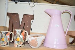 Mixed Lot: Large pink enamel jug, a large illuminated letter 'M', further Ringtons tea jugs and a