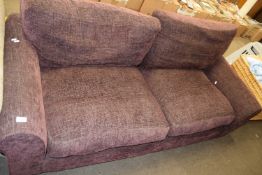 Brown two seater sofa