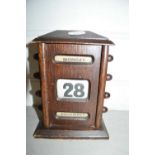 Small oak perpetual calendar, 18cm high