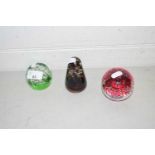 Three various assorted paperweights