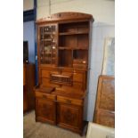 Late Victorian American walnut secretaire cabinet with glazed top section, top down front with