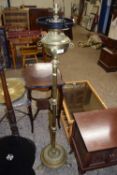 Brass oil lamp on stand