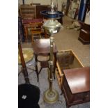 Brass oil lamp on stand