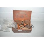 Small box of base metal and wood hat pin stands and assorted pins