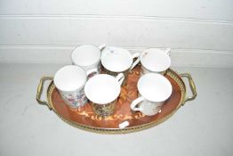 Oval serving tray and a quantity of mugs