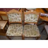 Pair of upholstered dining chairs