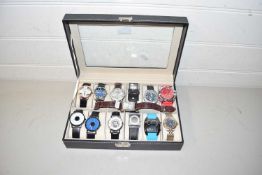 Case of gents modern wristwatches