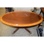 Reproduction oval mahogany and inlaid pedestal coffee table