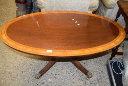 Reproduction oval mahogany and inlaid pedestal coffee table