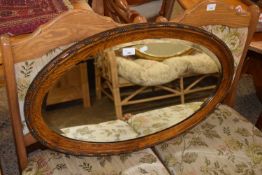 Oak framed bevelled wall mirror