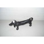 Cast iron boot scraper formed as a Dachshund