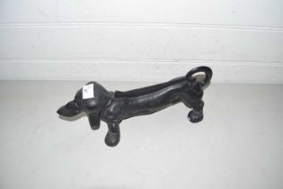 Cast iron boot scraper formed as a Dachshund
