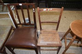 Cane seated business chair and a mahogany dining chair