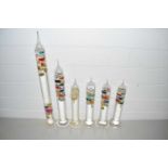 Six various glass Galileo thermometers