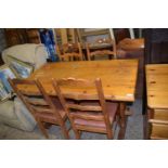 Rectangular pine kitchen table and four chairs