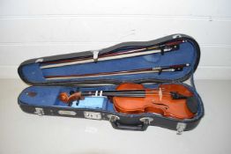 Cased child's violin with bows