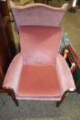 Pink upholstered armchair