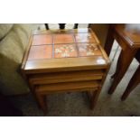 Nest of three tile top tables