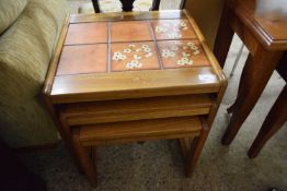 Nest of three tile top tables