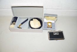 Mixed Lot: Folding opera glasses, miniature bedside clock and a gents vanity set