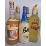 Selection of Peach Schnapps together with Bali Caribb3an rum and coconut tropical drink and a