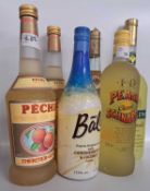 Selection of Peach Schnapps together with Bali Caribb3an rum and coconut tropical drink and a