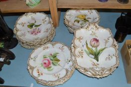 19th Century part dessert service decorated with flowers, heavily cracked and damaged throughout