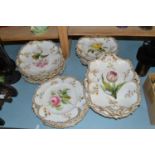 19th Century part dessert service decorated with flowers, heavily cracked and damaged throughout
