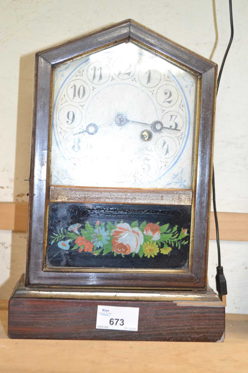 Musterschutz mantel clock with floral decoration