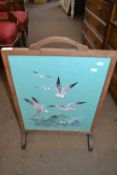 Fire screen decorated with needlework panel of seagulls