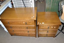 Modern oak four drawer chest and accompanying bedside cabinet