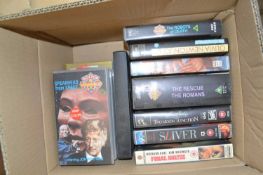 One box of mixed videos