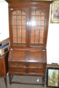 Early 20th Century oak bureau bookcases with lead glazed top section