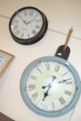 Two modern battery operated wall clocks