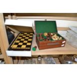 Modern turned wooden chess set and accompanying folding board