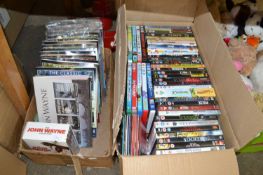 Large mixed lot of DVD's to include John Wayne